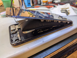 tukar bateri phone di seremban 2
